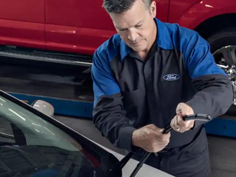 service tech working on wiperblades John Megel Ford in Cleveland GA